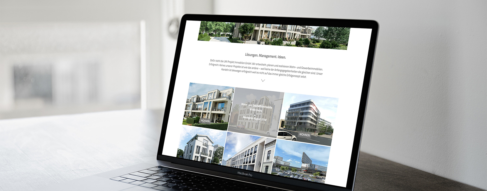 LMI Projekt Immobilien Website auf Laptop